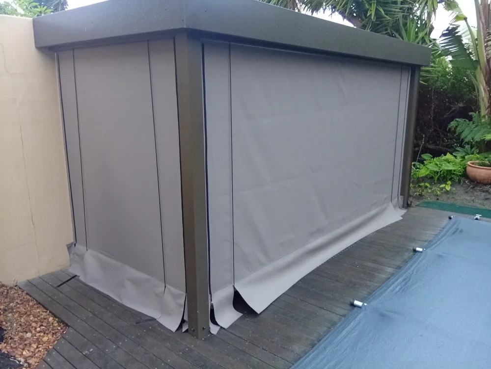 Outdoor blinds fitted around a pergola
