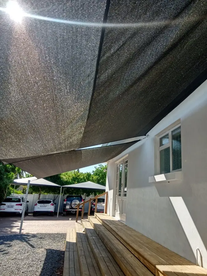 Shade sail installed over a patio